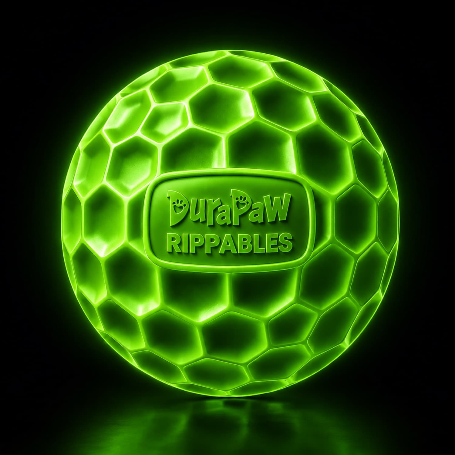 Glowing green DuraPaw Rippables RipShield Core ball on a black background